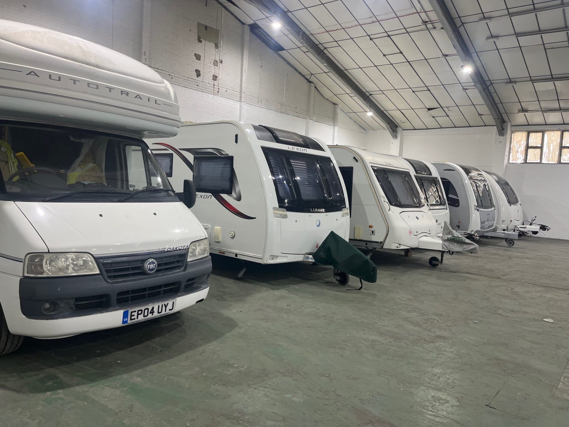 Caravans and a motorhome stored under cover at MTS Storage